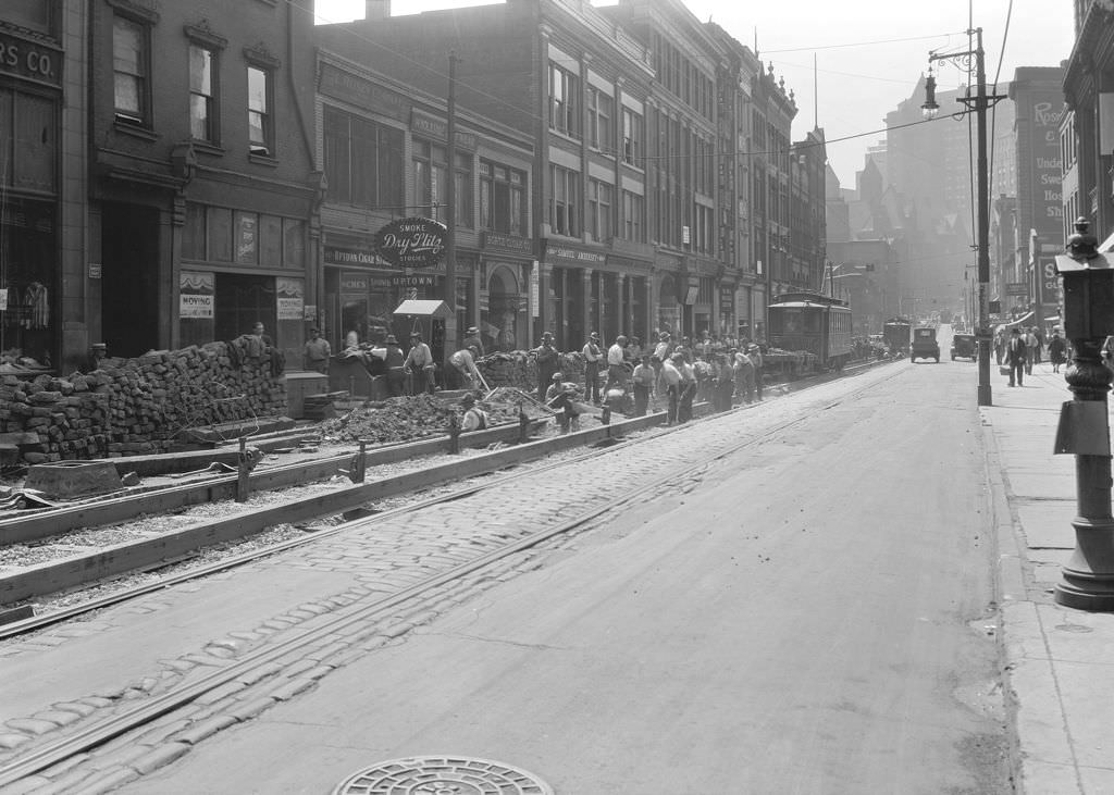 #96 Fifth Avenue construction from Hooper Street, shows Uptown Cigar and more, 1930
