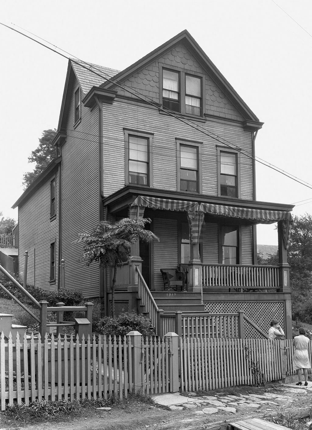 #120 W. Maus’ two-story frame house, 1931