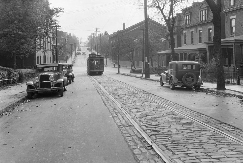 #140 81 Atwood Trolley, Ward Street view with 81 Atwood trolley and NRA signs, 1933.