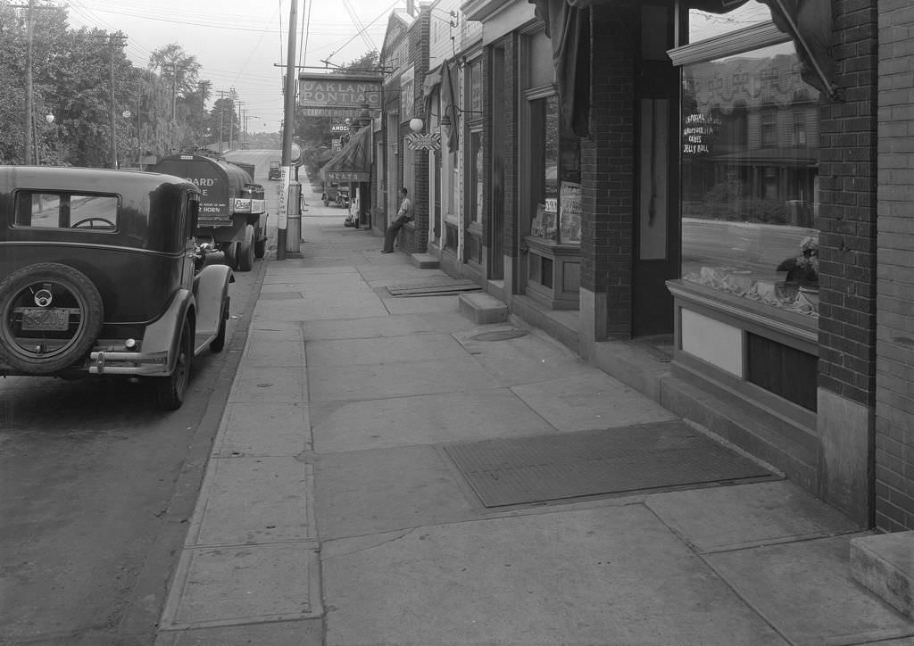 #157 Carrick Stores, Brownsville Road looking north with various businesses, 1931.