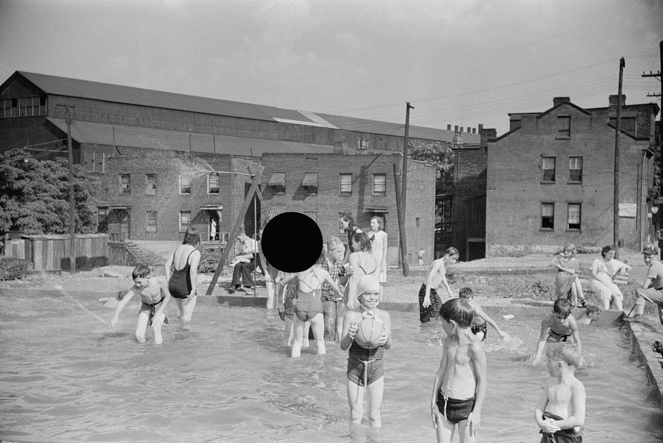 #175 Homemade pool by steelworkers for their children, Pittsburgh, Pennsylvania, 1938.