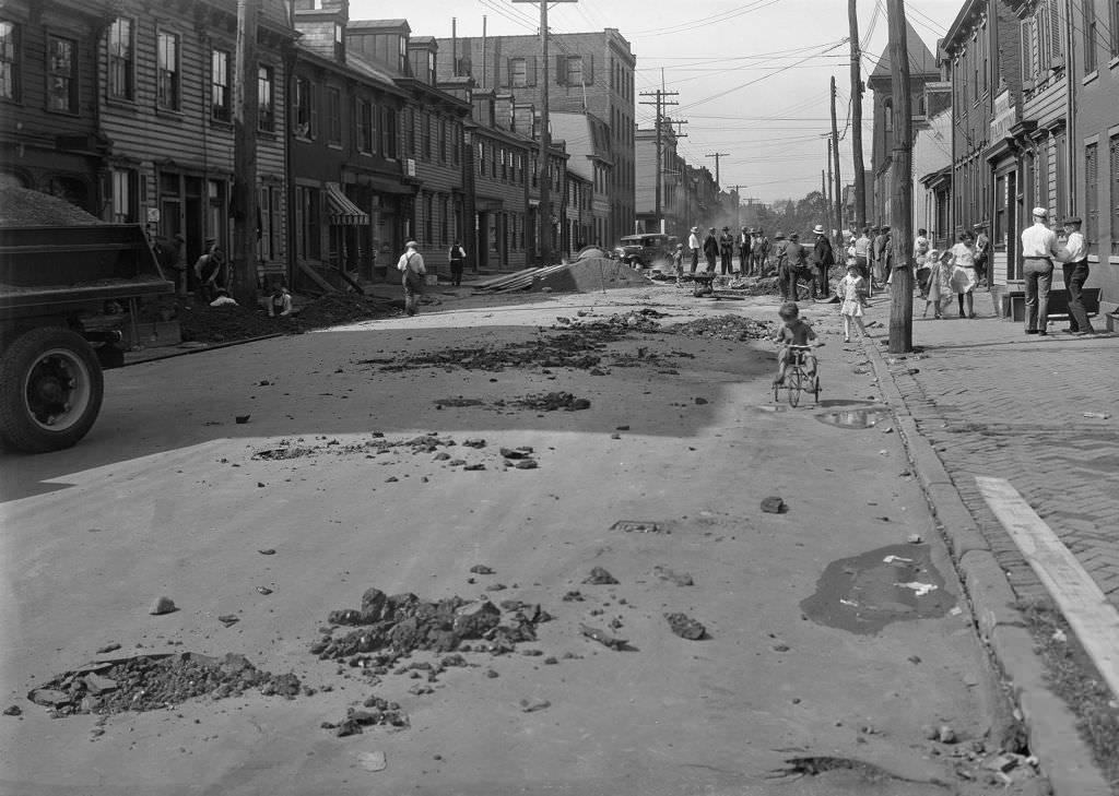 #92 Suismon Street water main break showing road conditions, 1930
