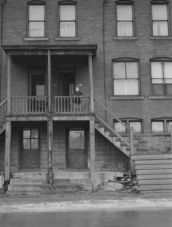 #102 Houses in a slum area in Pittsburgh, 1940.