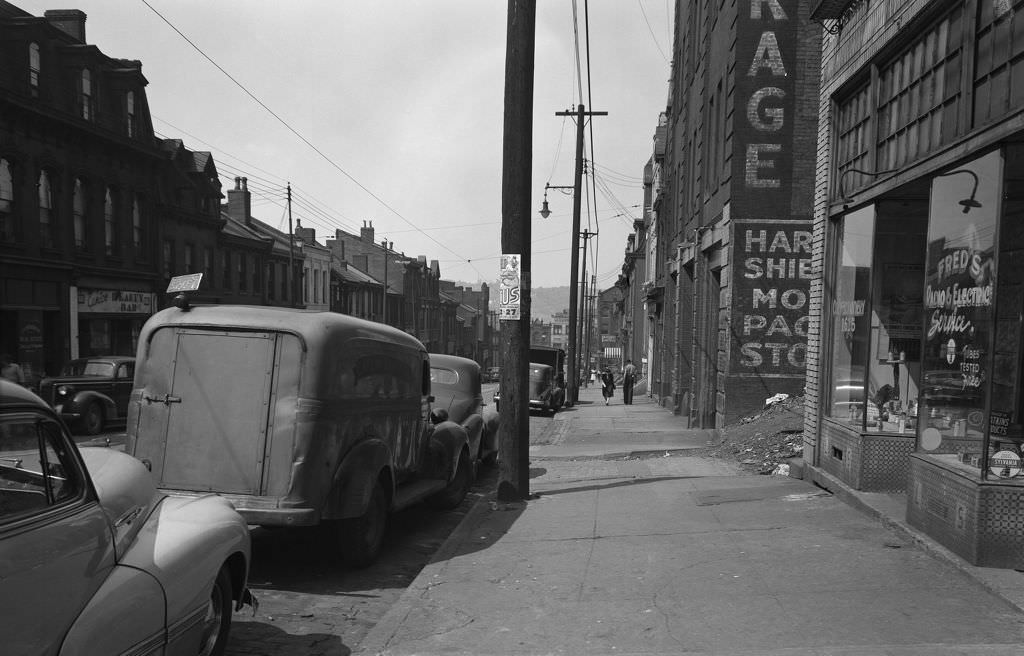 #64 Shops on Centre Avenue, looking West. Fred’s Radio and Electric Service on the Right and Eunice’s Beauty Bar on the Left, 1946