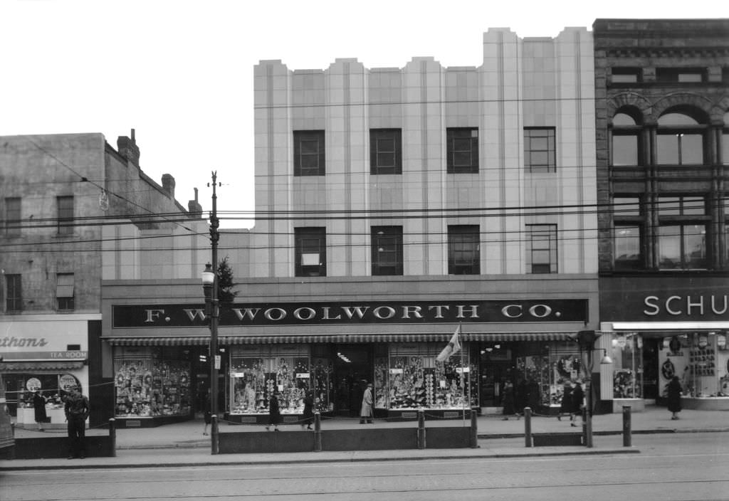 #2 F. W. Woolworth Company decorates their windows for Christmas, 1940