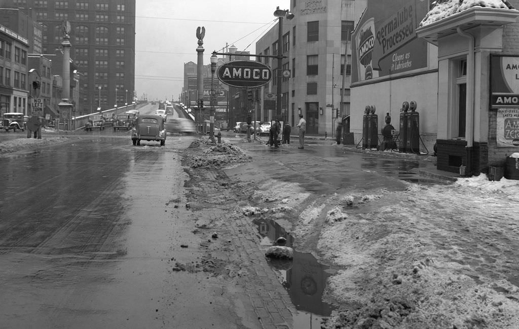#25 Snow Removal at the Amoco Station, Boulevard of the Allies and Grant Street looking east at 3:25 p.m., 1941