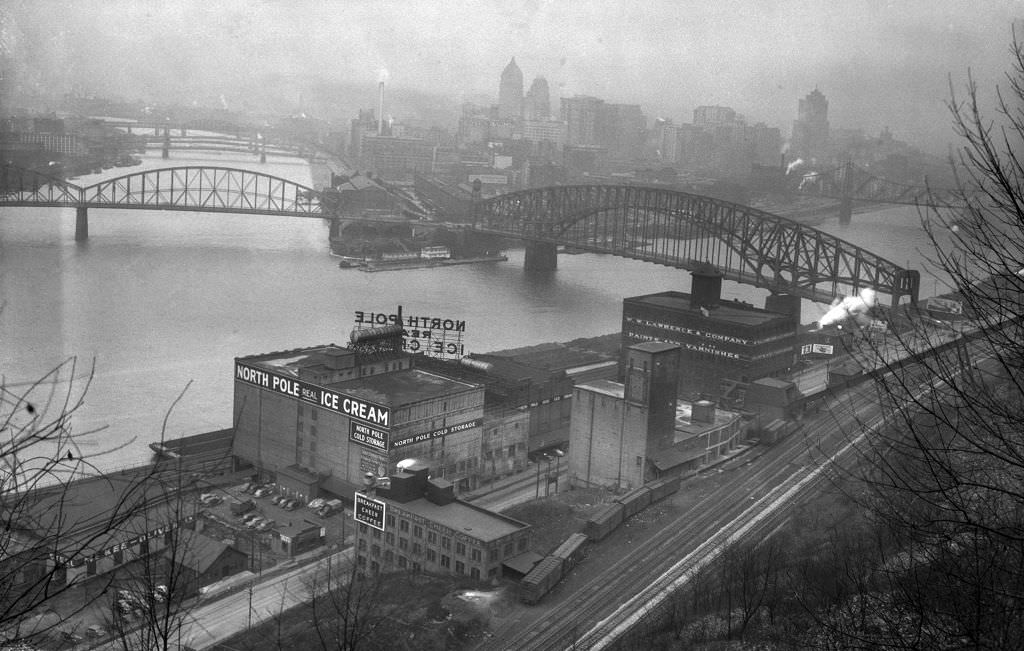 #32 General view of the Fort Pitt exploration area from Duquesne Heights near North Pole Ice Cream and Breakfast Cheer Coffee, 1942