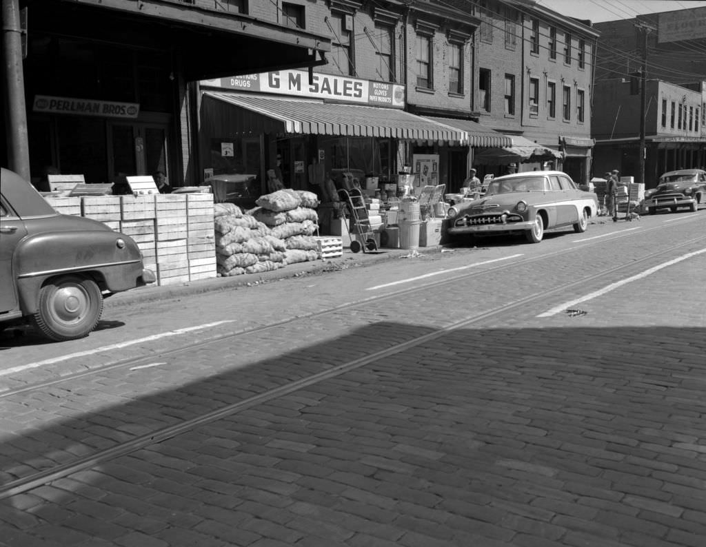 #125 Perlman Bros. and GM Sales on the 1800 block of Penn Avenue, 1956
