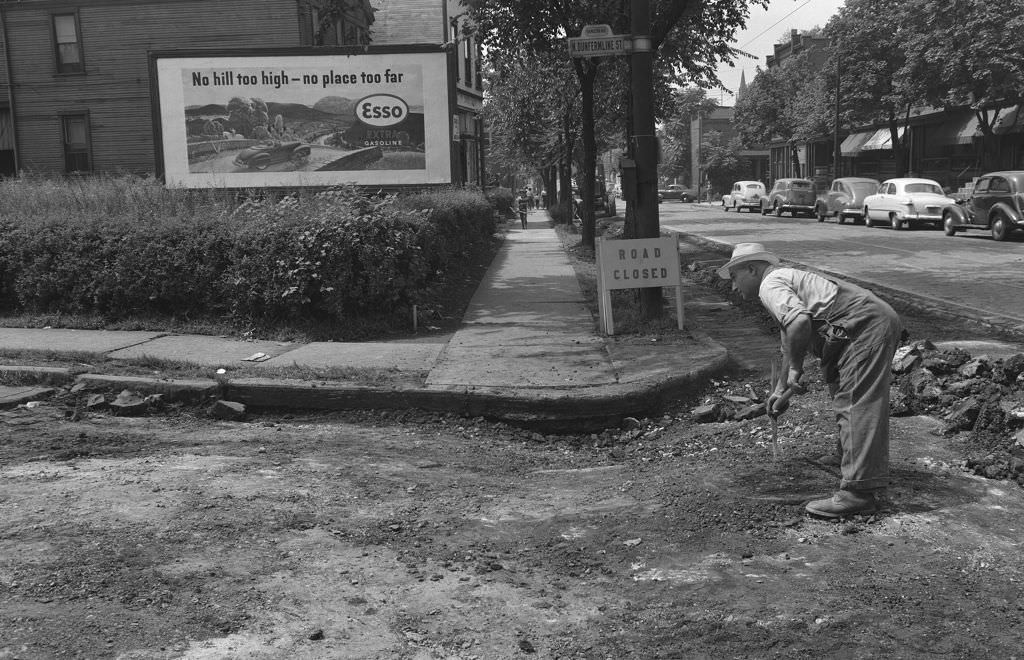 #50 Worker Repairs Sunken Pavement on Dunfermline Street, 1950