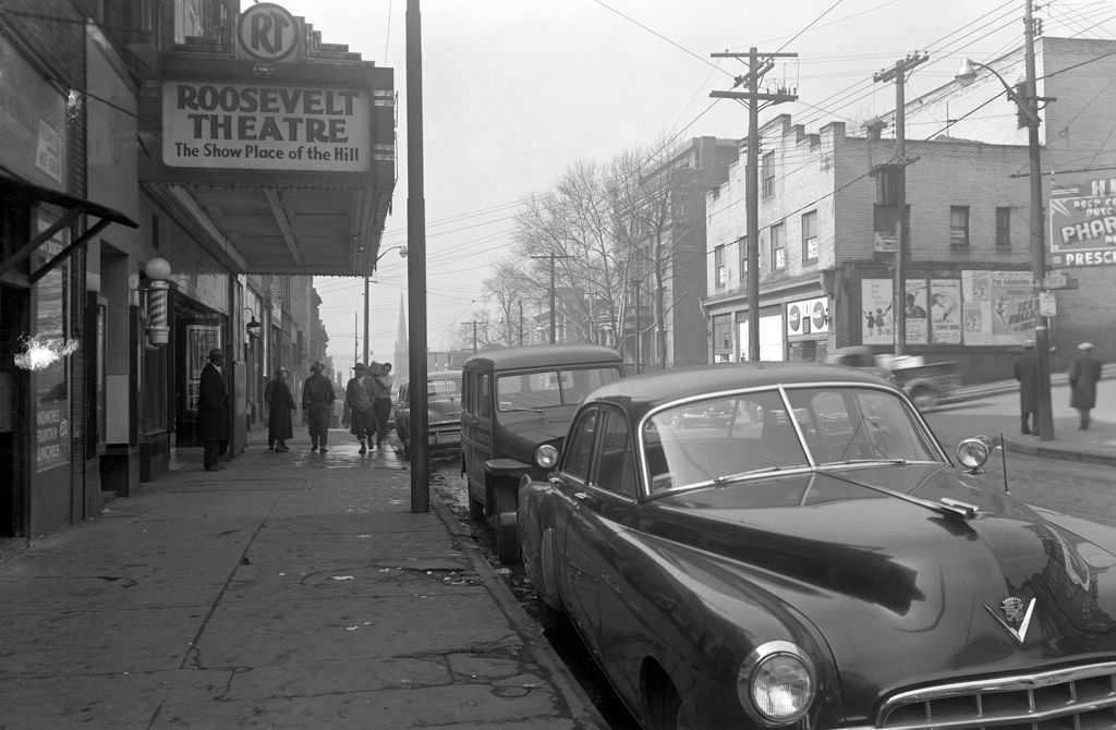 #7 Hill District redevelopment featuring Roosevelt Theatre on Centre Avenue, 1953.