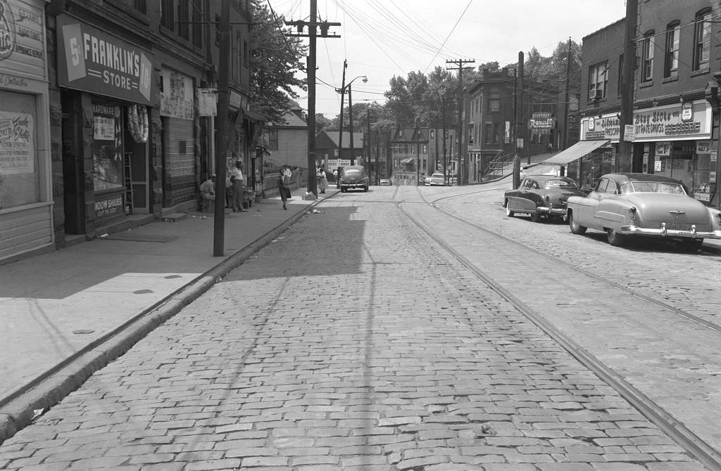 #10 Hill District redevelopment on Herron and Wylie Avenues featuring stores, 1953.
