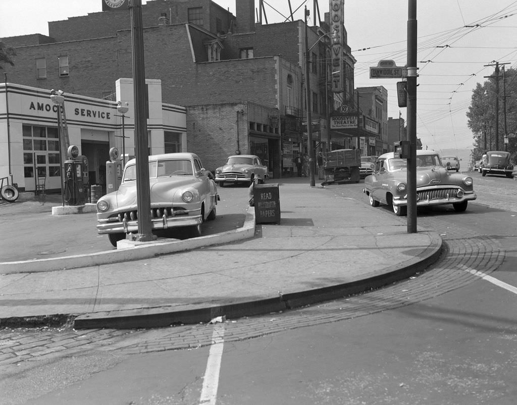 #73 Roosevelt Theatre at Centre and Dinwiddie featuring American Oil Station, 1955.