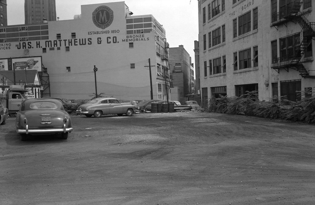 #93 Pennant Place toward Forbes Avenue with James H. Matthews & Co. and Pittsburgh Board of Education, 1950