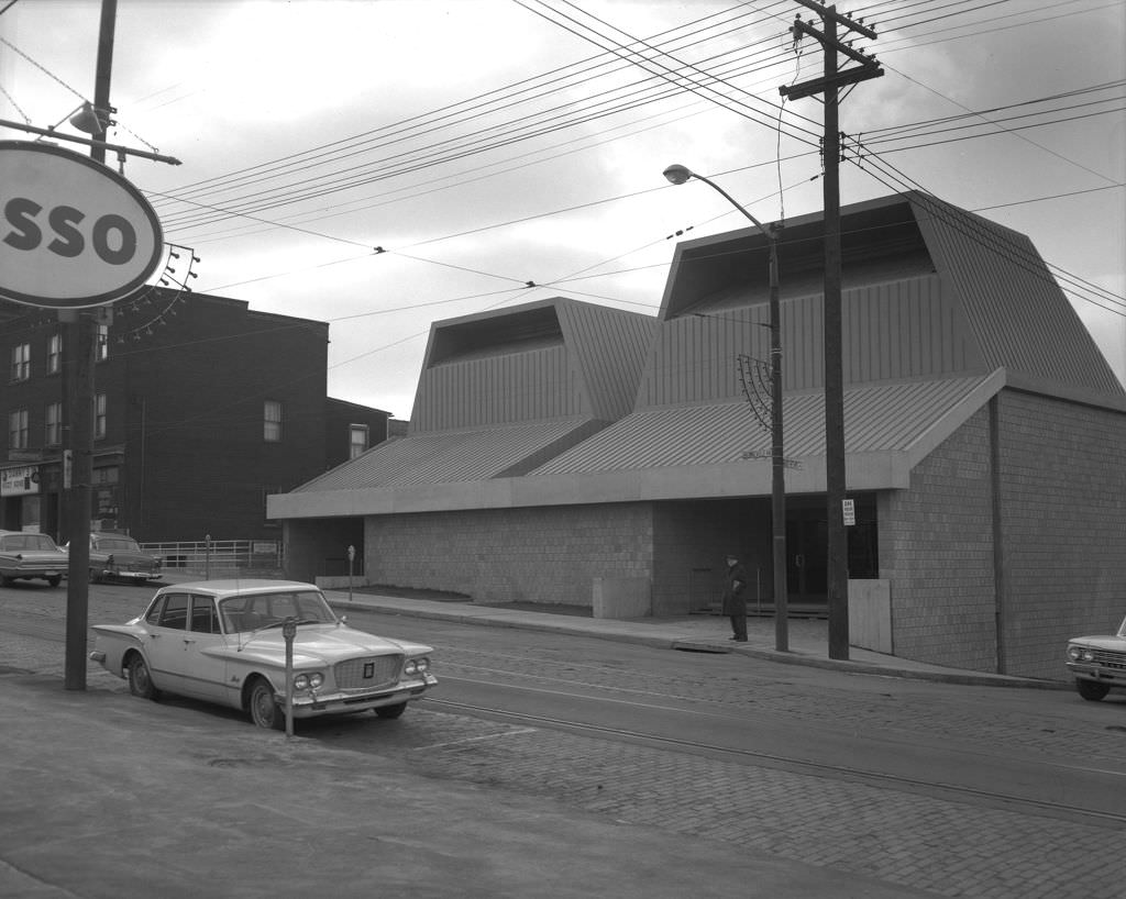#12 A lone man stands at the Knoxville Library, at the corner of Brownsville Road and Mathews Avenue, 1966.