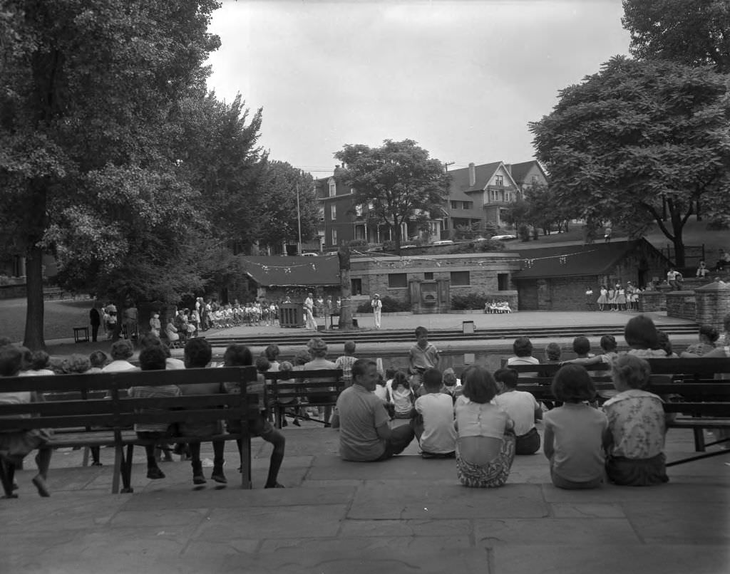 #96 Fun Day at Arsenal Park, spectators watching a show, 1961.