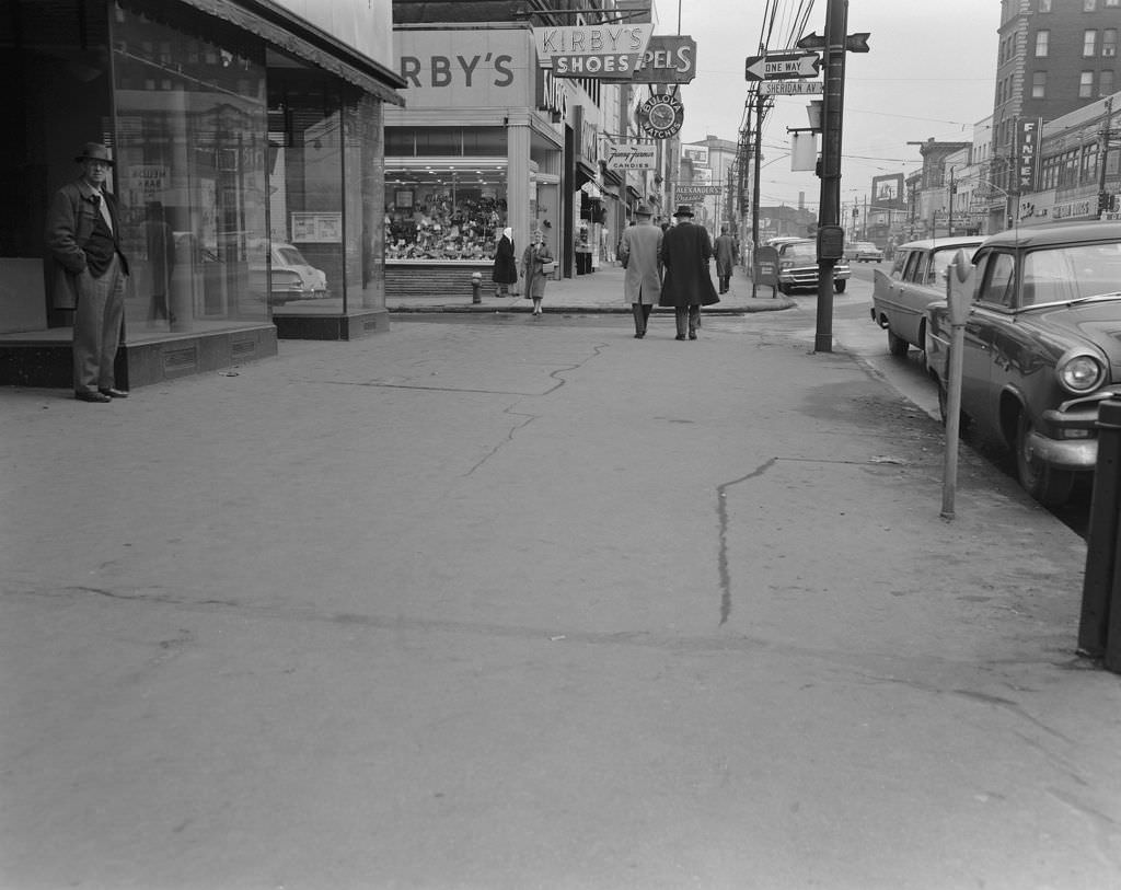 #109 Penn Avenue in East Liberty, features local businesses including Kirby’s Shoes and Fanny Farmer Candies, 1960.