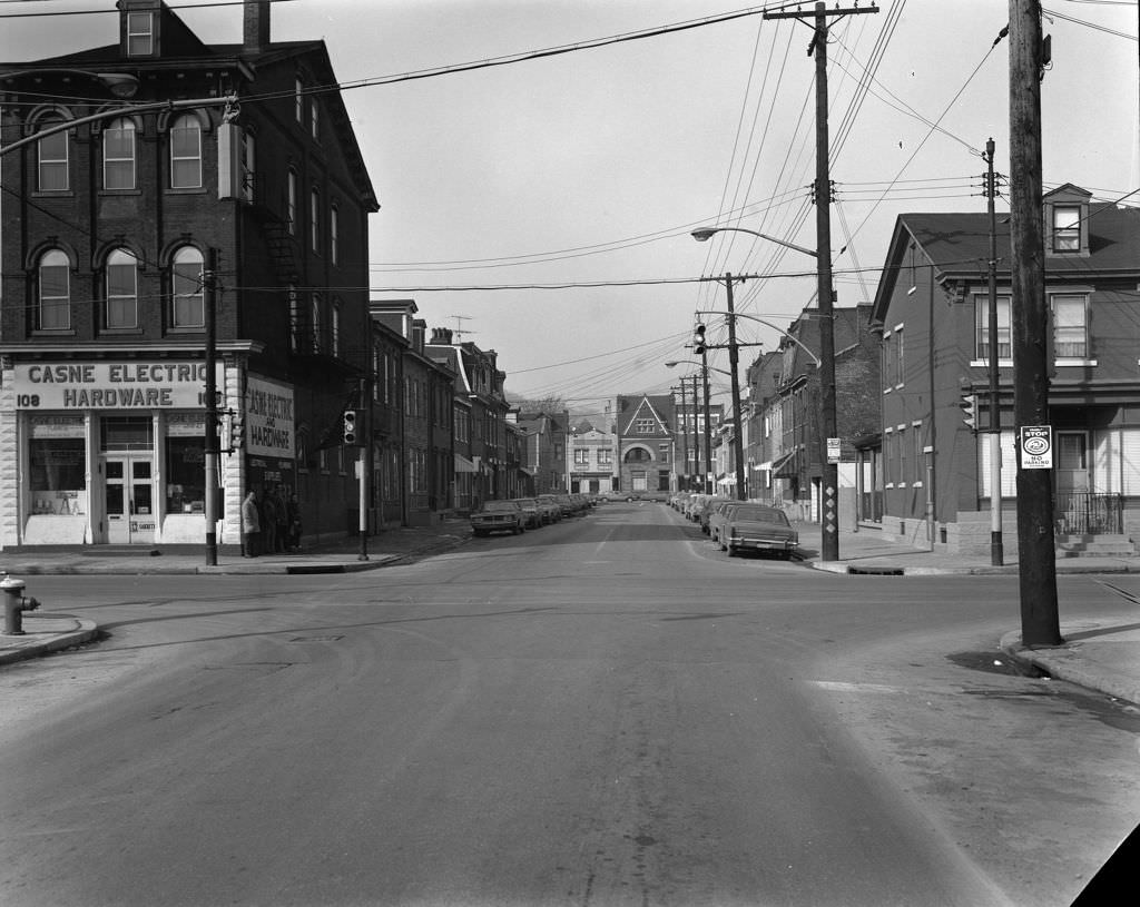 #110 Sarah Street meets South 18th Street, includes Casne Electric hardware store, 1971.