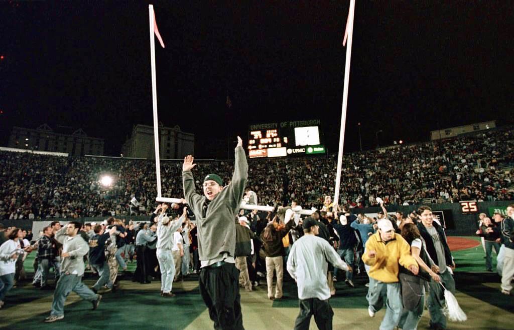 #4 Students storming the field after the last game at Pitt Stadium on November 13, 1999.