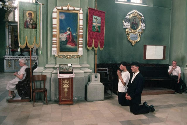 #33 People praying at Orthodox Catholic Church in Ukraine, 1991