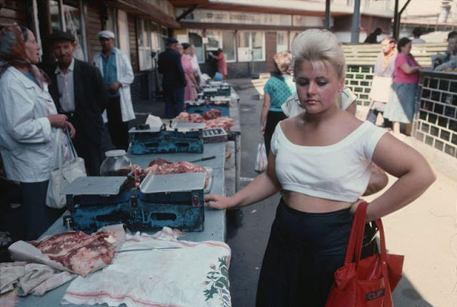 #37 The girl at the meat stall on the street of Lviv, Ukraine, 1991