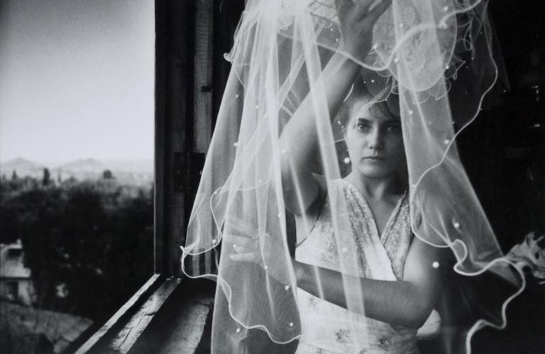 #27 Irina preparing her veil on her wedding day, June 1993.