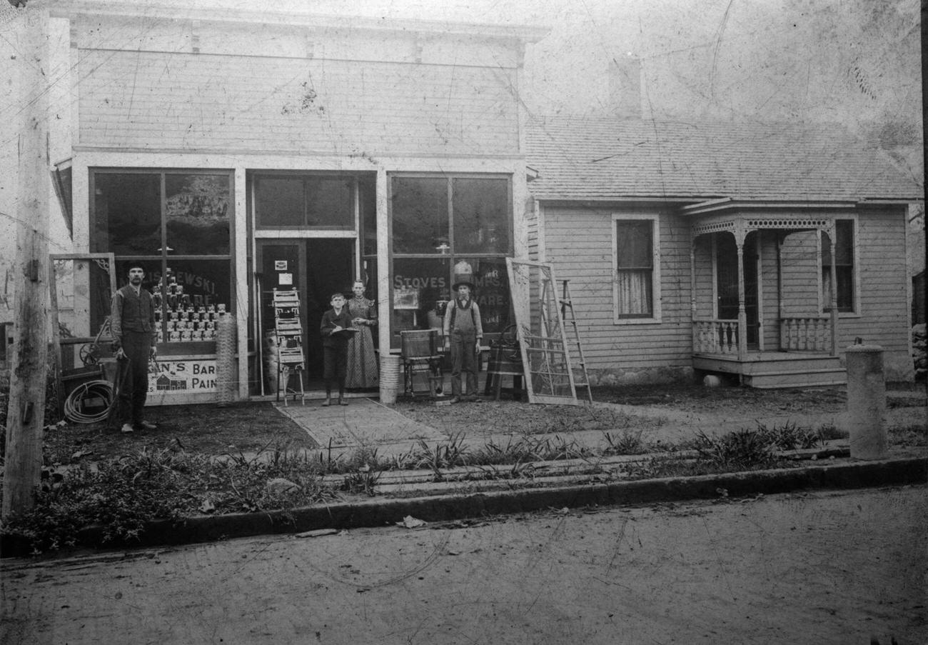 #10 Family at Hardware Store Entrance, USA, 1900