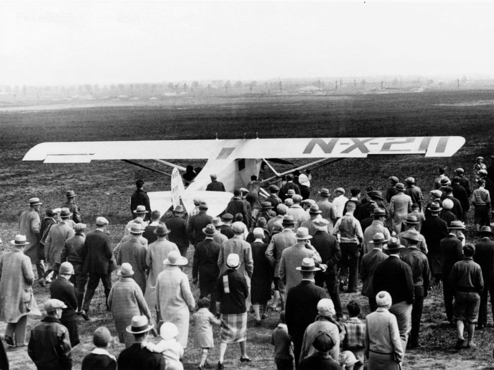 #1 Crowd assembled at Roosevelt Field to witness Lindbergh’s departure.
