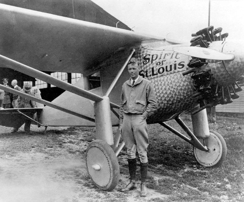 #6 Charles Lindbergh with his famed Spirit of St. Louis plane, circa 1927.