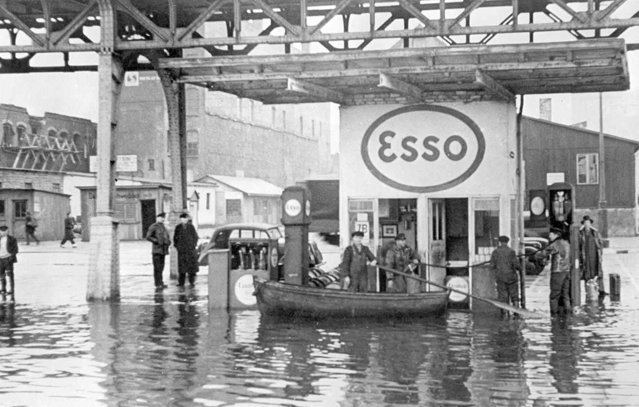 #28 Rowboat delivers gasoline to customers during flood in Hamburg, 1949.