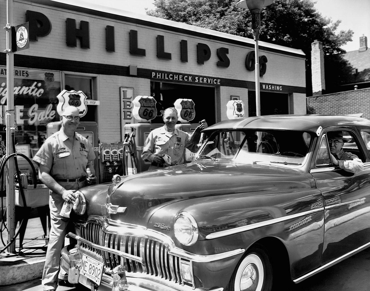 #35 Attendants and Motorist at Phillips Service Station.