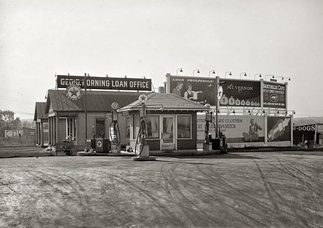 #79 Early “mall” offering loans, meals, and auto services, 1920s.