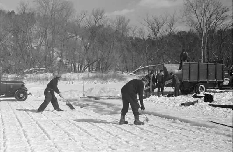 #37 A photograph that captures the ice cutting process on the Ottauquechee River in 1936.