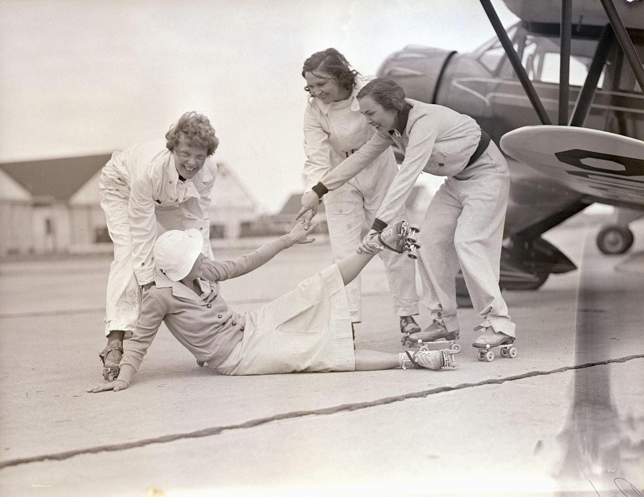 #12 Amelia Earhart and Aviatrices Help a Fallen Skater, 1933.