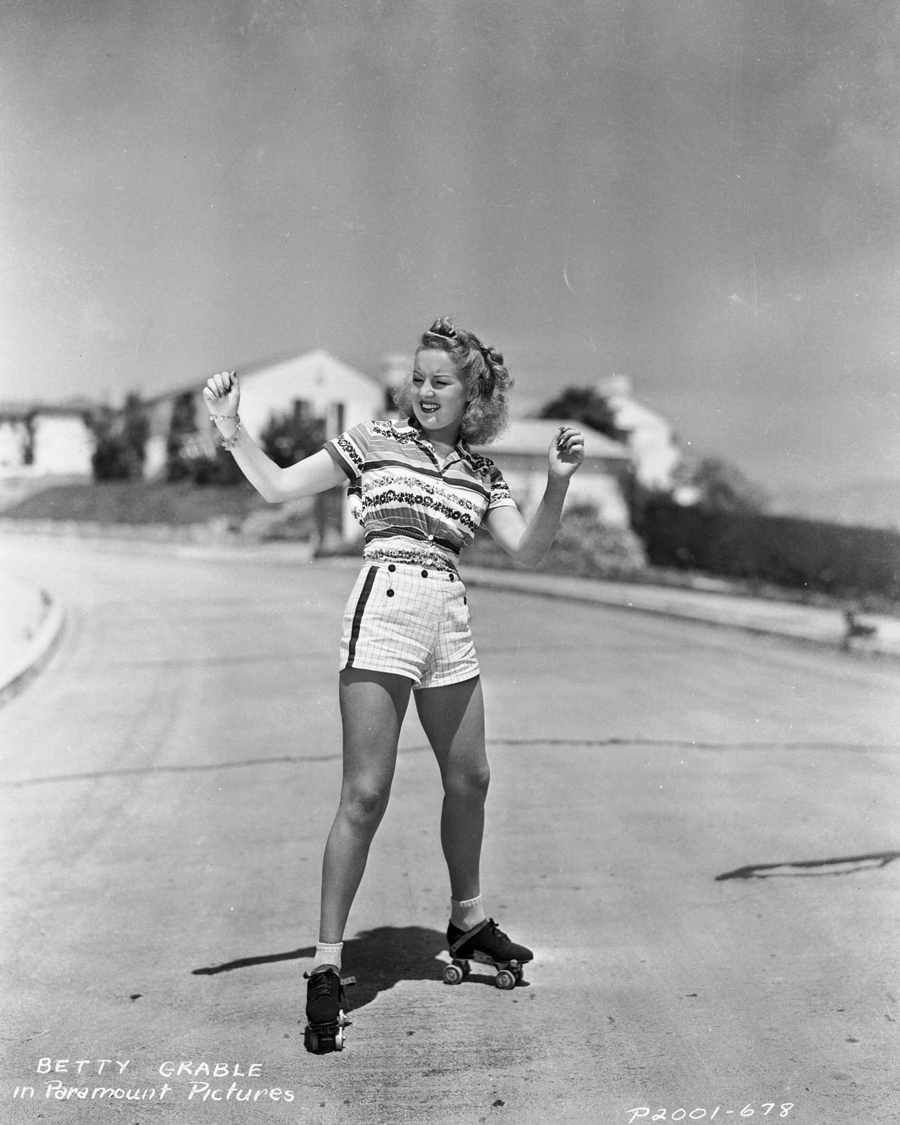 #14 Actress Betty Grable Balancing on Roller Skates, circa 1935.