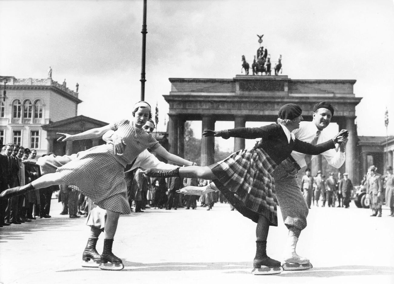 #21 Skaters in Front of the Brandenburg Gate, Berlin, 1937.