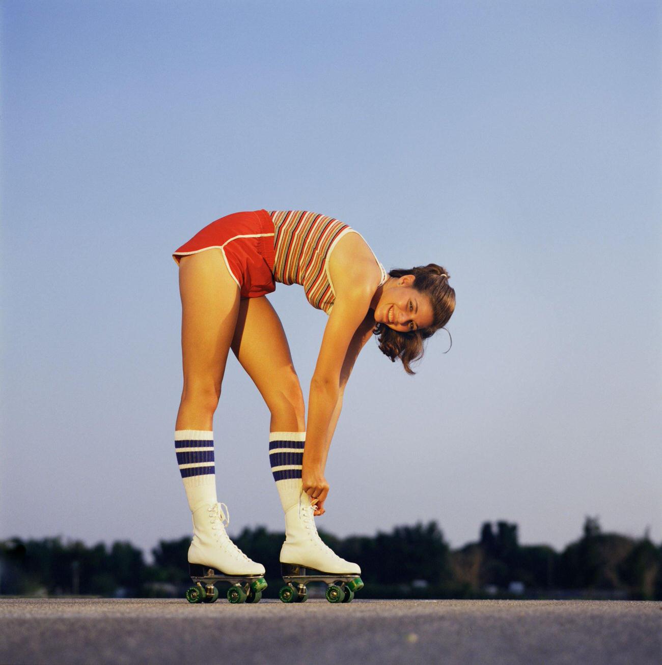#58 Woman Tying Laces of Her Roller Skates