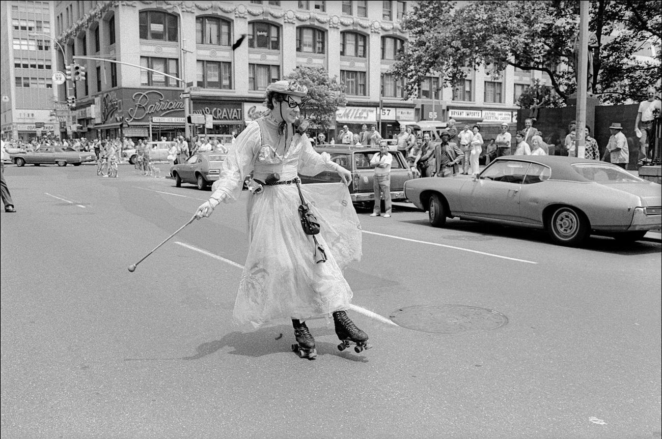 #68 Roller Skater in Ankle-Length Dress at Gay Pride Parade, New York, 1975