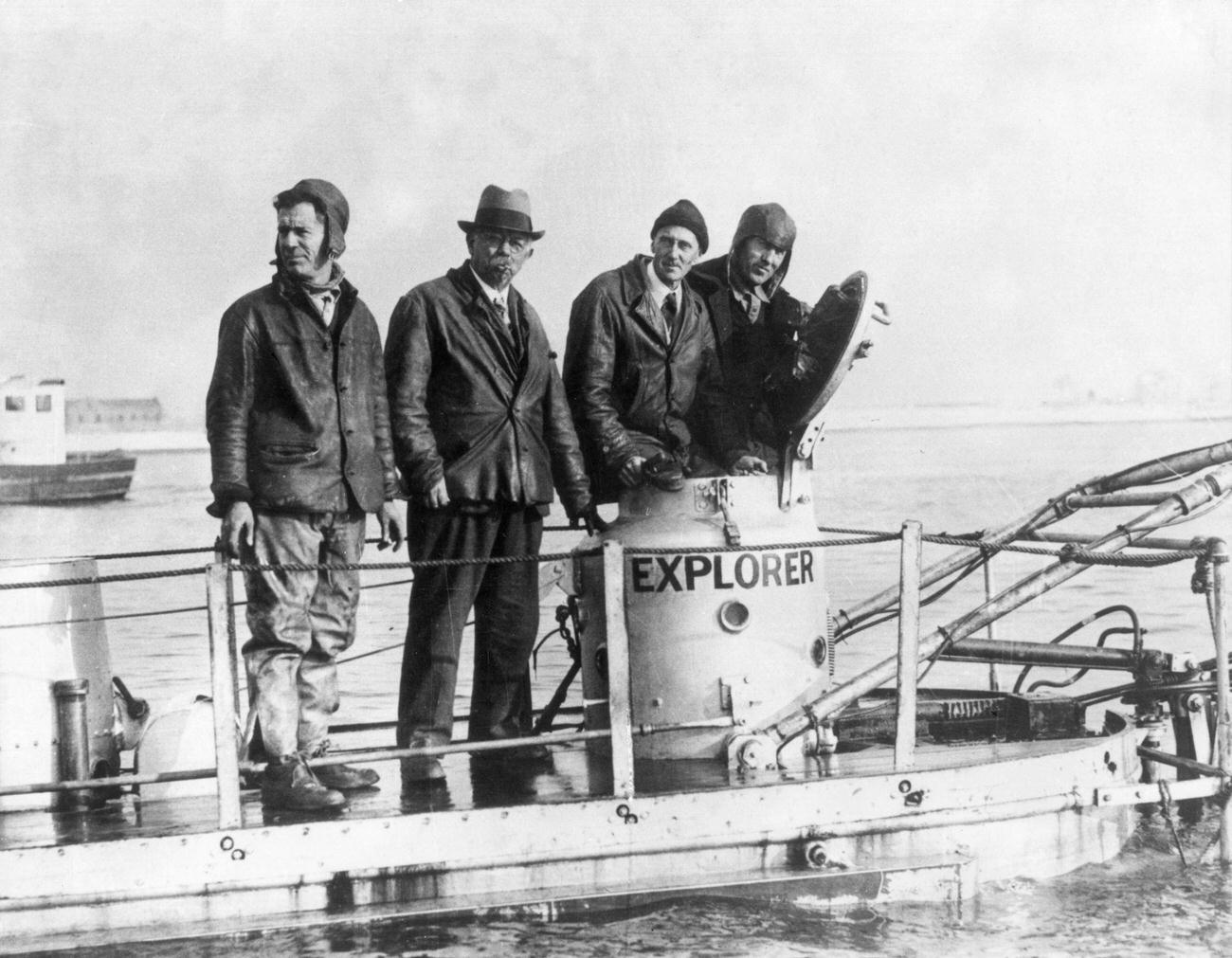 American Navy diver Frank Crilley, Simon Lake, William Beebe, and Jack Dunbar on deck of Lake’s Explorer submarine, Long Island Sound, 1932.