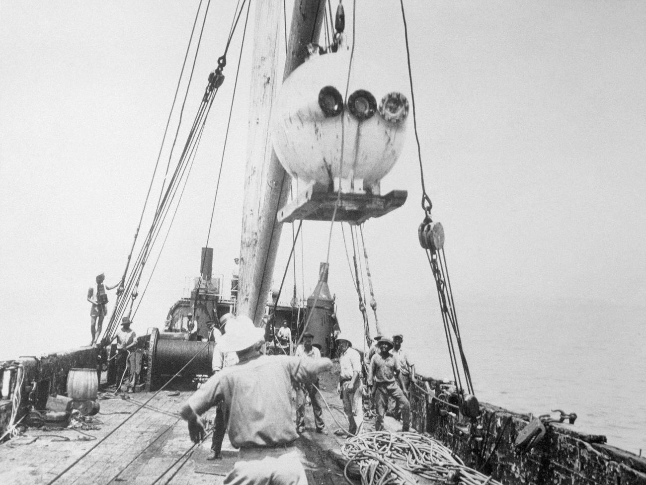 William Beebe conducting undersea explorations in bathysphere, Nonsuch Island, Bermuda.