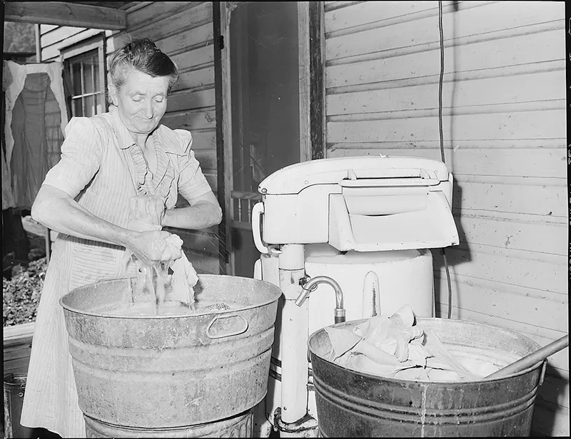 Miner’s wife on washday, Bradshaw Mine, West Virginia, 1946.
