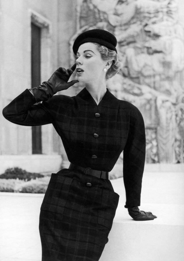 #9 Stella in Madeleine de Rauch’s wool plaid afternoon dress, 1953.