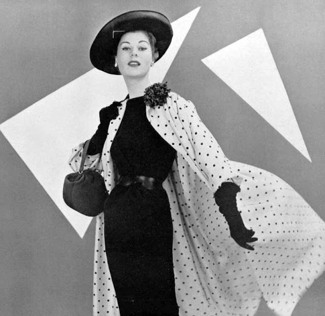 #10 Stella in Madeleine de Rauch’s silk coat and alpaca dress, 1953.