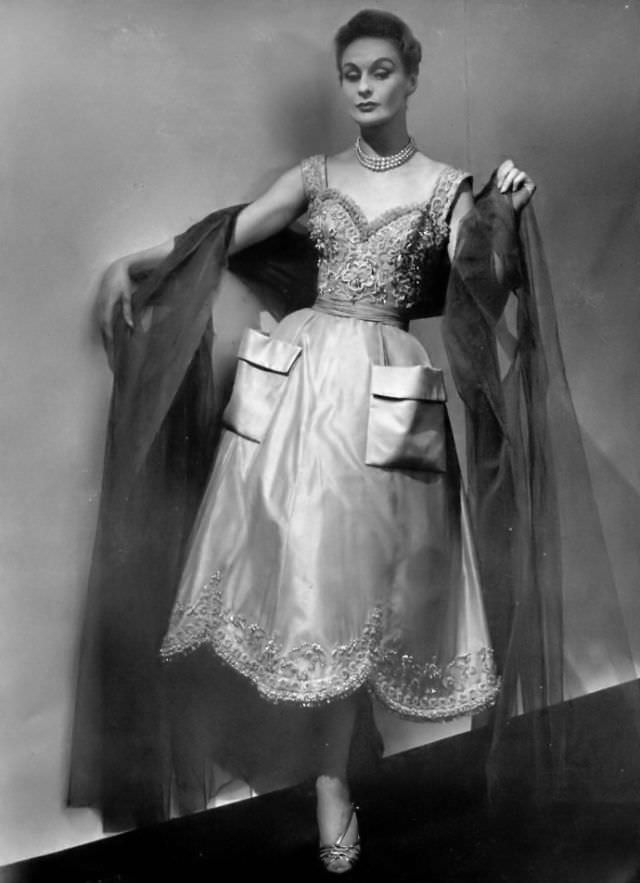 #12 Anna in Madeleine de Rauch’s honey-colored satin dance dress, 1954.