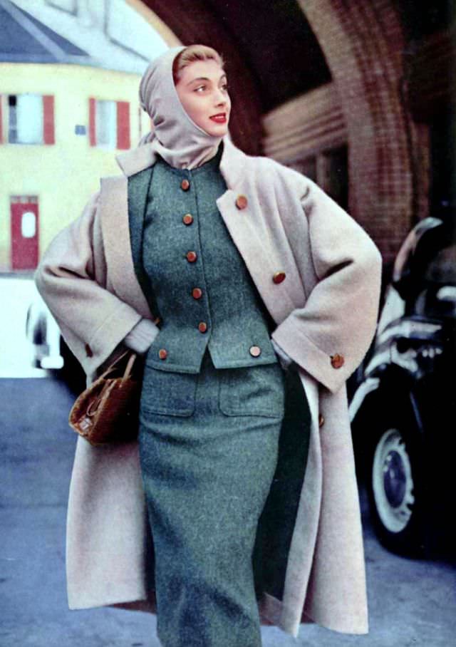 #14 Marie-Hélène in Madeleine de Rauch’s wool coat and tweed suit, 1954.