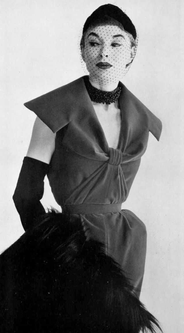 #16 Model in Madeleine de Rauch’s velvet cocktail sheath, 1954.