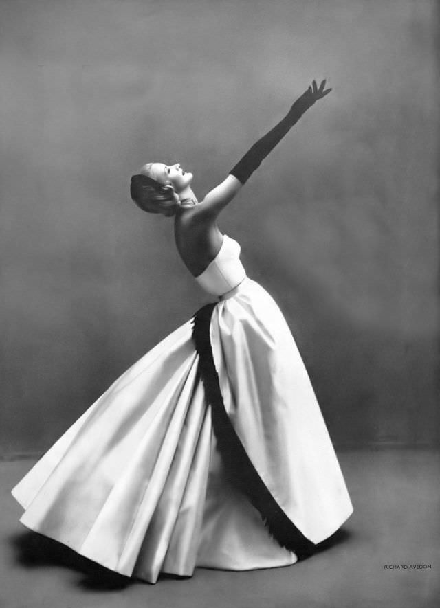 #17 Sunny Harnett in Madeleine de Rauch’s white satin gown, Harper’s Bazaar UK, December 1954.