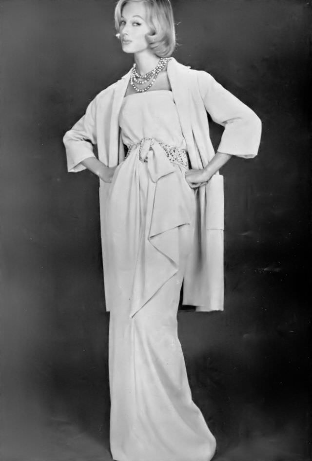 #26 Monique Chevalier in Madeleine de Rauch’s crêpe evening ensemble, 1957.