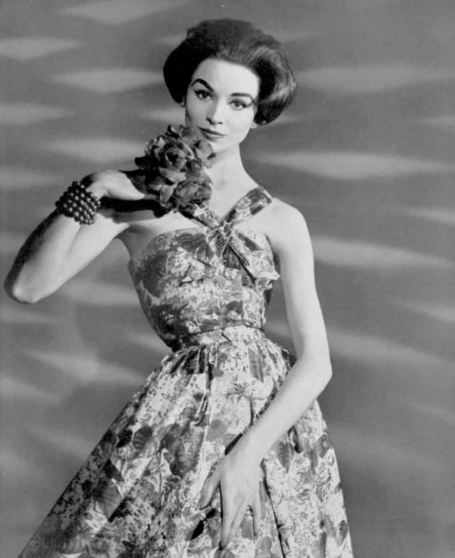 #27 Tan Arnold in Madeleine de Rauch’s cotton print halter dress, 1957.
