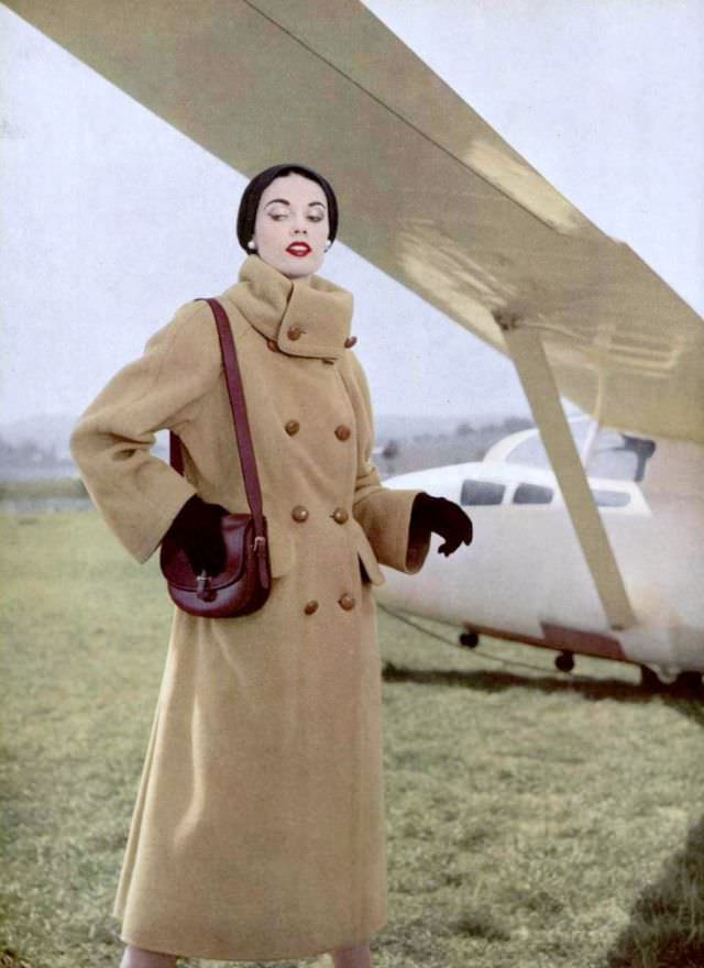 #2 Joan Whelan in Madeleine de Rauch’s camel-hair coat and Hermès accessories, 1952.