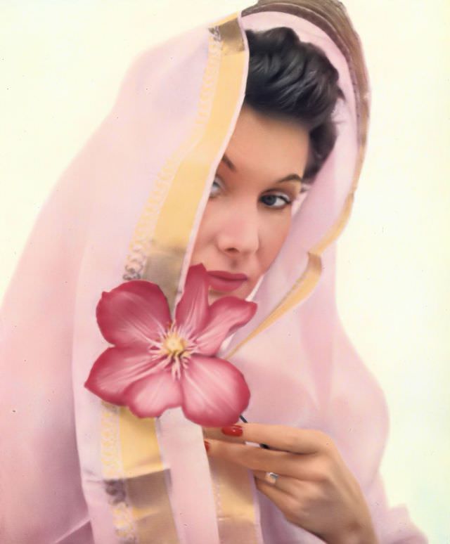#13 Barbara Goalen in Yardley cosmetics and Liberty sari, Harper’s Bazaar UK, February 1951.